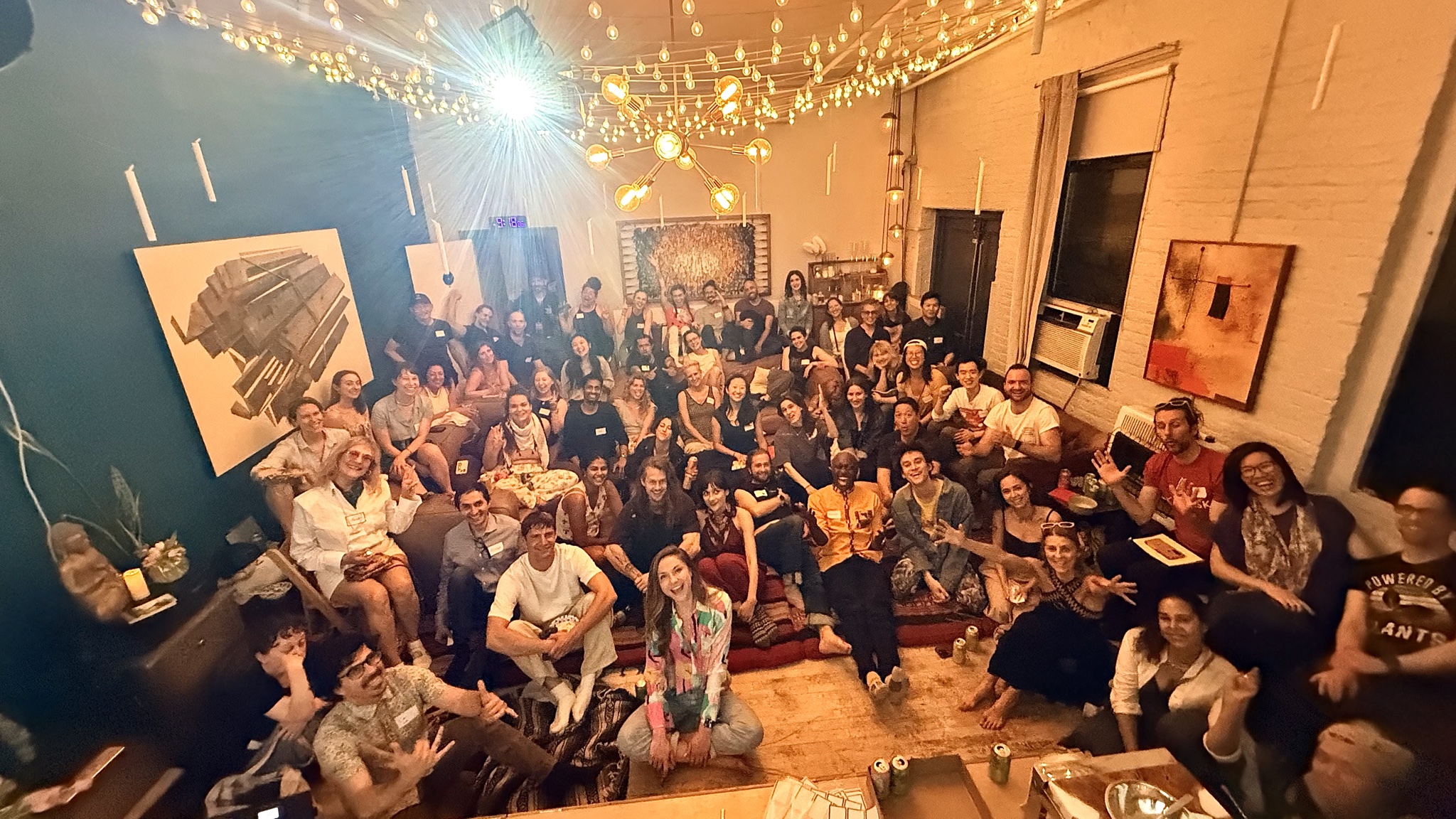 Sixty-five people packed into a Brooklyn living room for a Metacrisis Salon